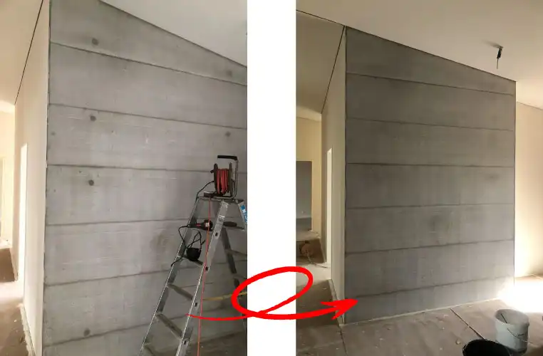 bernasconi_bau-referenzen-betonArt-2 Bauarbeiten im Innenbereich: Wandveränderung mit Betonstruktur, Leiter im Einsatz, Fortschritt markiert.